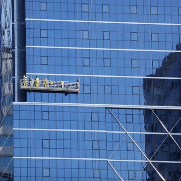 Commercial high-rise window cleaning by The Squeegee Wizards
